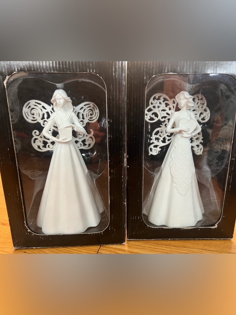 2 White Decorative Angel Figurines
